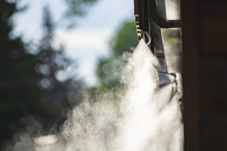 water spray system for cooling in a public cafe at the boiling hot summer day